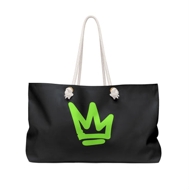 Just Deliver Success Perfect Travel Bag featuring a stylish black design with a vibrant green crown logo.