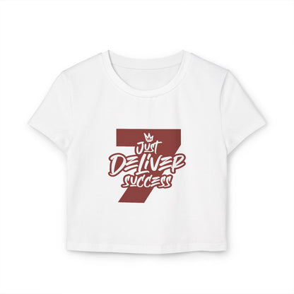 Just Deliver Success Women's Baby Tee That City 7 Collection in white with bold maroon lettering.