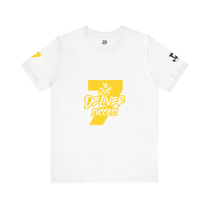 Just Deliver Success Gold That City 7 Summer Collection white t-shirt with yellow print on the front.