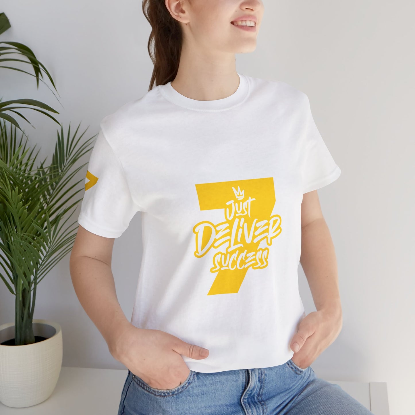 Just Deliver Success Gold That City 7 Summer Collection, casual white t-shirt with yellow graphic design.
