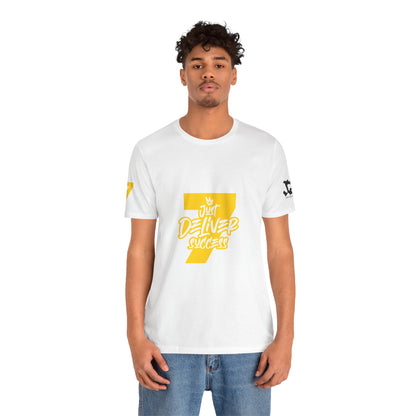 Model wearing Just Deliver Success Gold That City 7 Summer Collection white t-shirt with graphics.