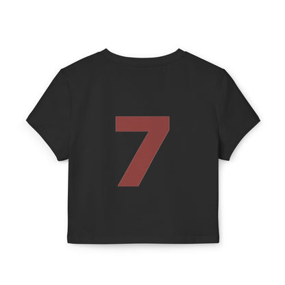 Just Deliver Success Women's Baby Tee That City 7 Collection black crop tee with red number 7 on the back.