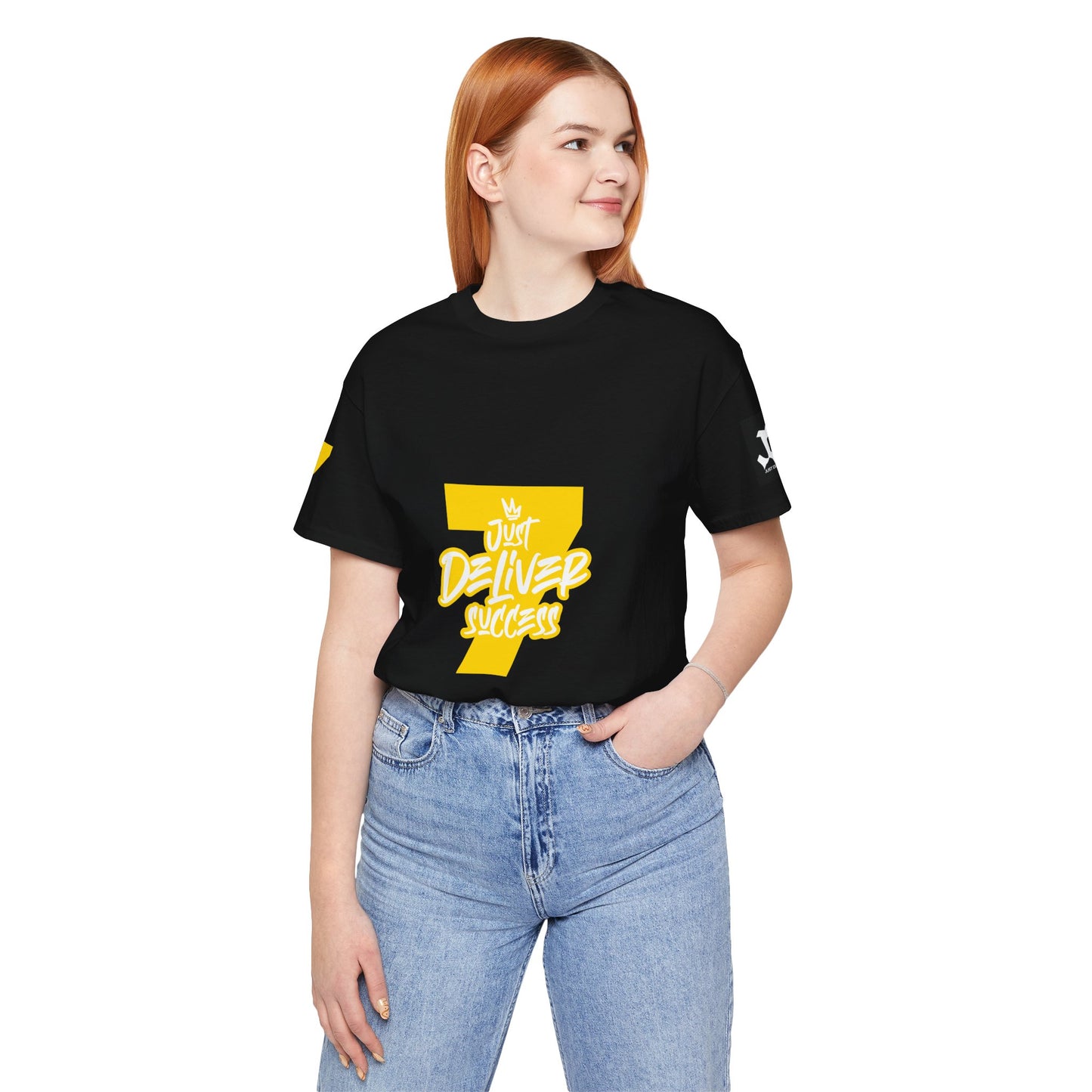 Woman wearing Just Deliver Success Gold That City 7 Summer Collection black t-shirt with bold yellow graphic.